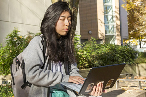 alexander-college-compsci-student-outside.jpg