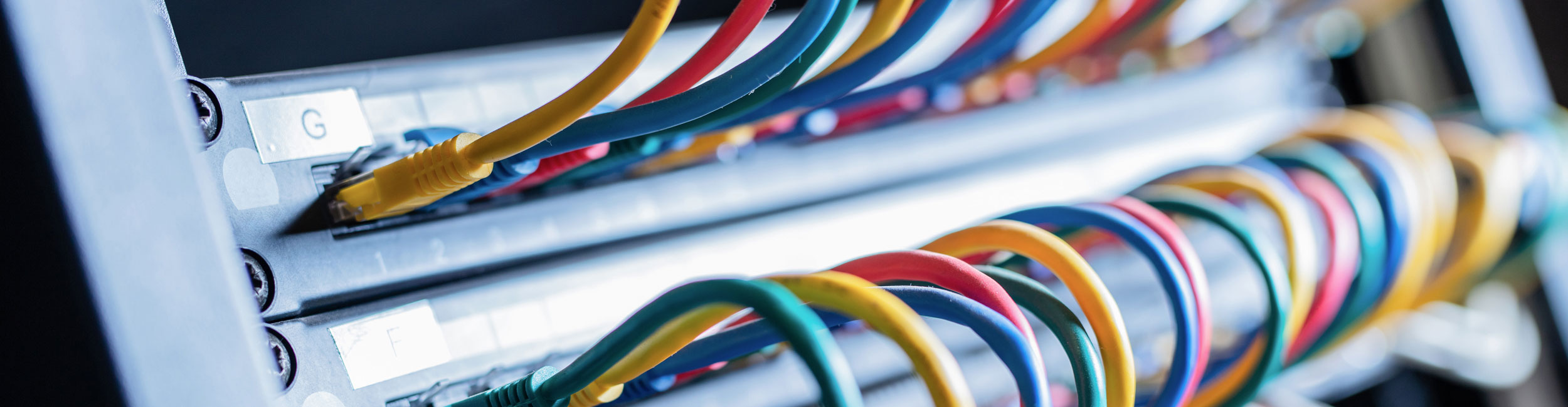 A close up of cables connected to servers