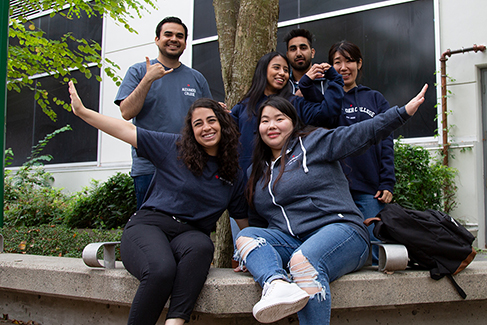 group of students striking a pose