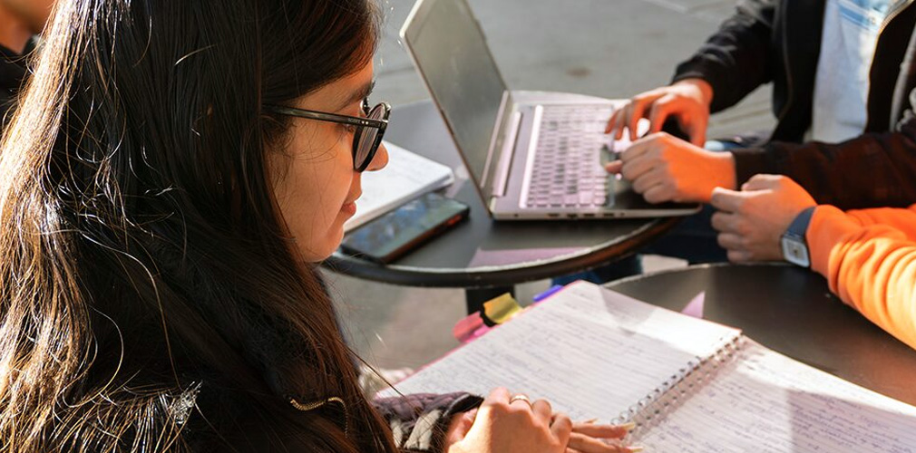 student reviewing her notes
