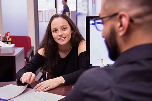 alexander-college-student-working-with-staff