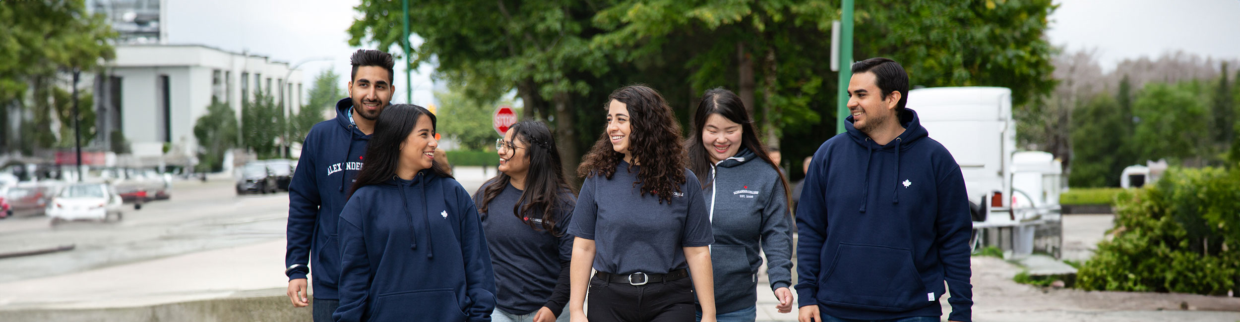 alexander-college-students-with-college-merch-outside