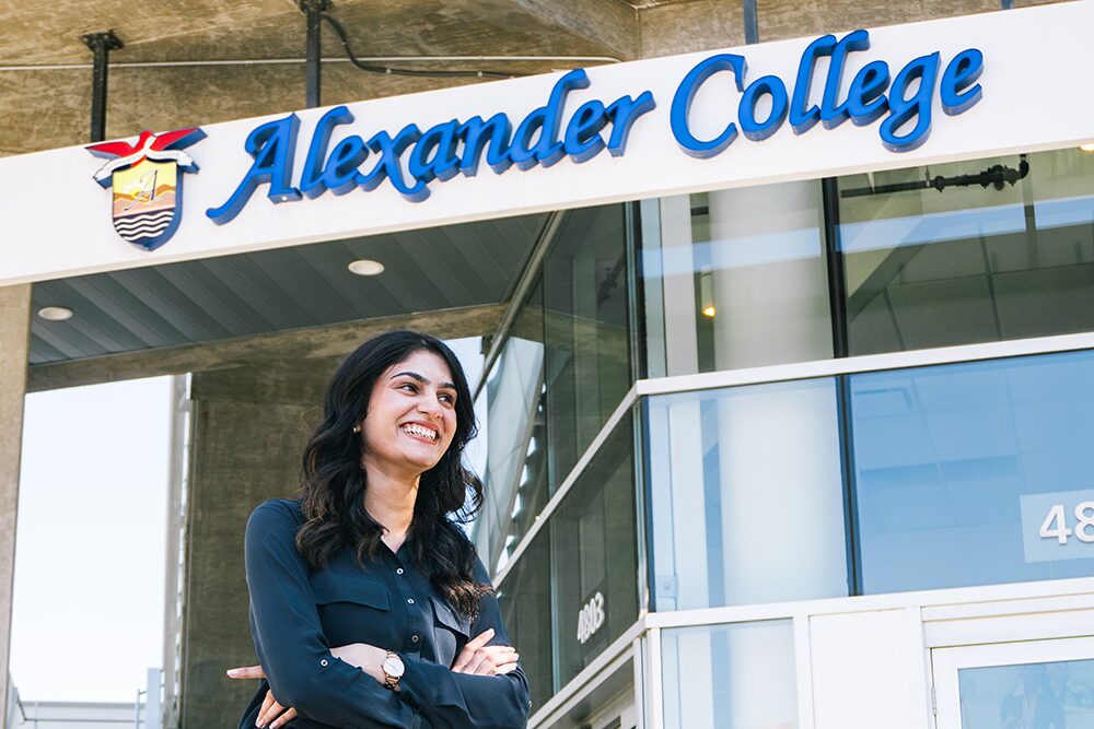 amanpreet under the alexander college sign