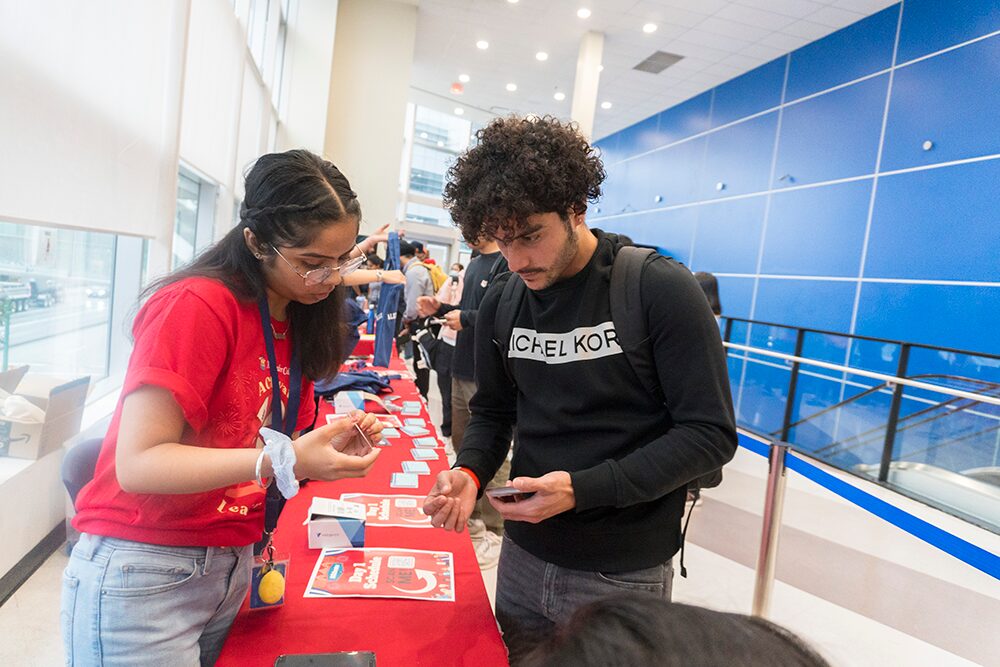 staff helping with check-ins