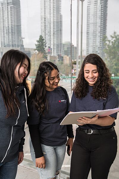 Students wearing school merch