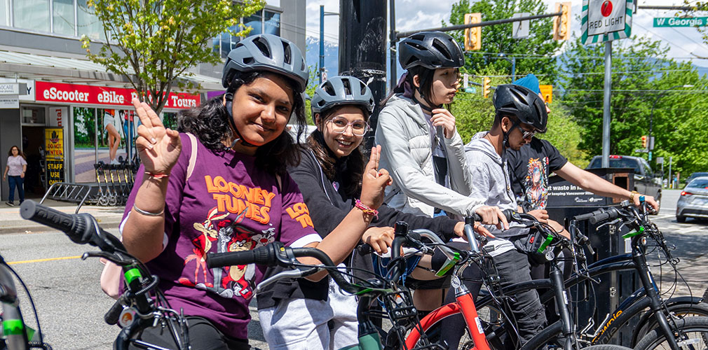 Alexander College students posing with bikes