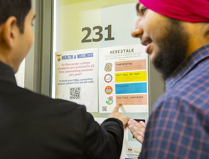 students outside the Health and Wellness office