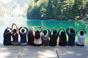 students enjoying a lake