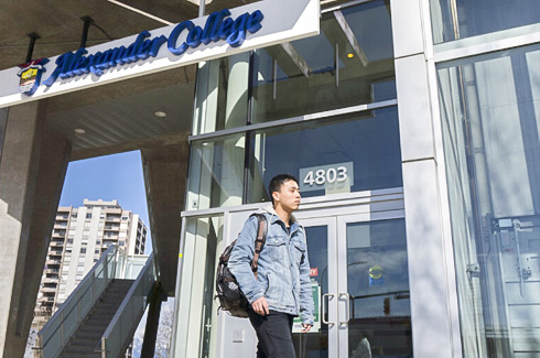 A student walking outside Buranby campus