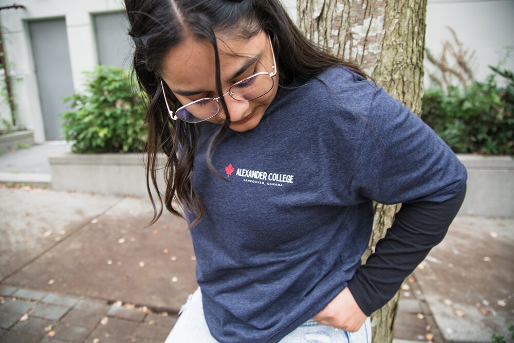 Student showing off front of tshirt