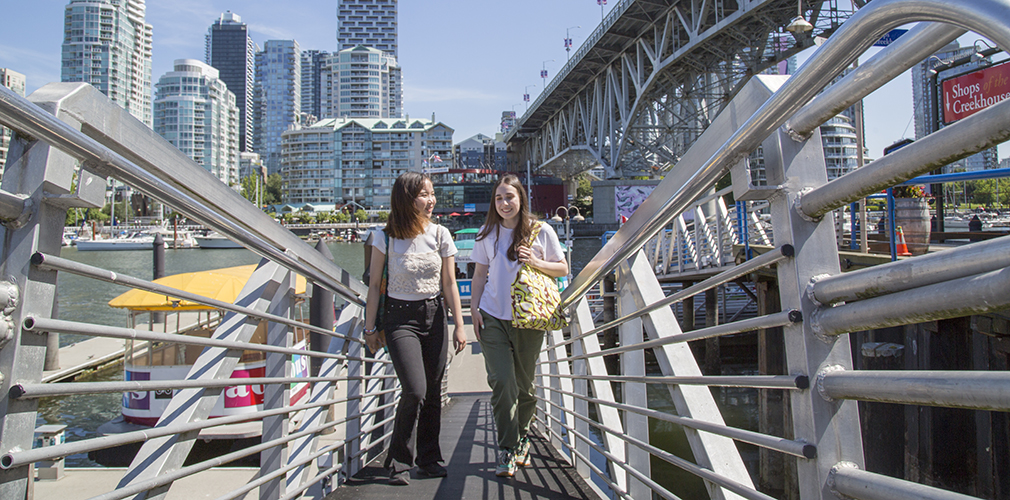 two girls walking downtown