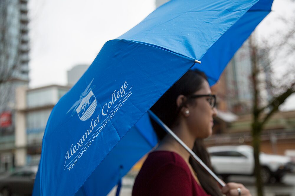umbrella with school logo