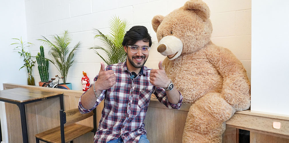 Vanshik giving two thumbs up
